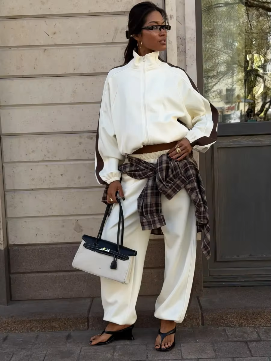 Ivory and brown colorblock tracksuit with high-collar zip jacket and relaxed wide-leg pants