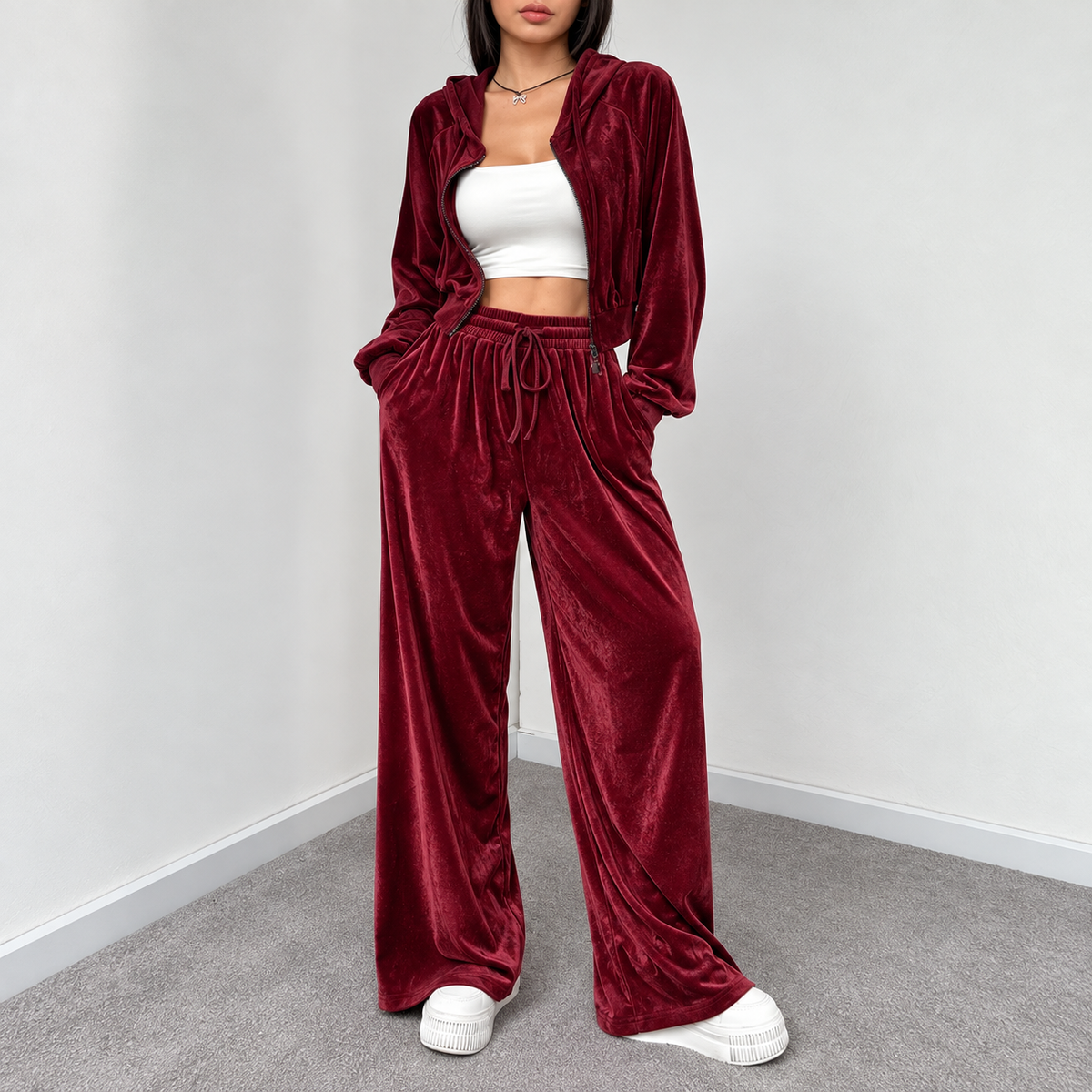 Burgundy velour cropped hoodie and wide-leg pants matching set with soft plush finish and side pockets