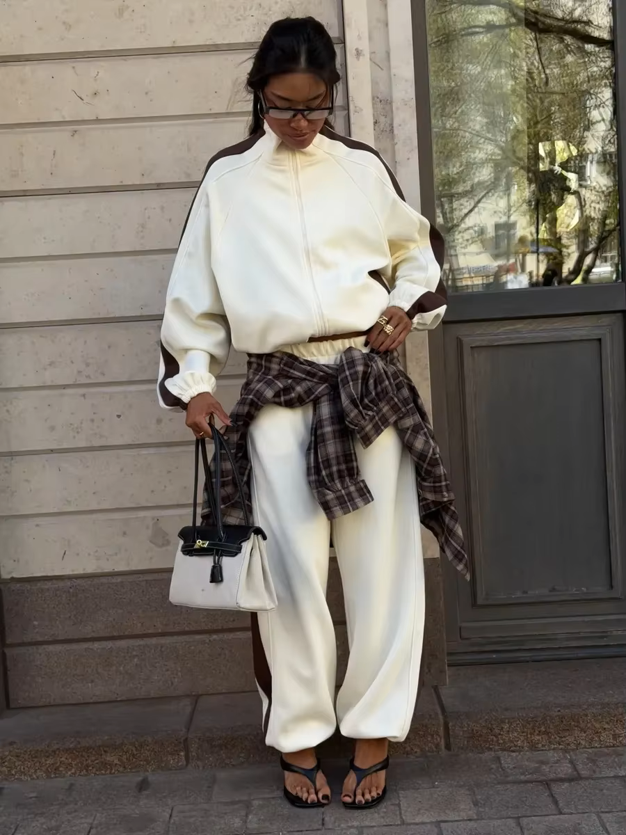 Ivory and brown colorblock tracksuit with high-collar zip jacket and relaxed wide-leg pants