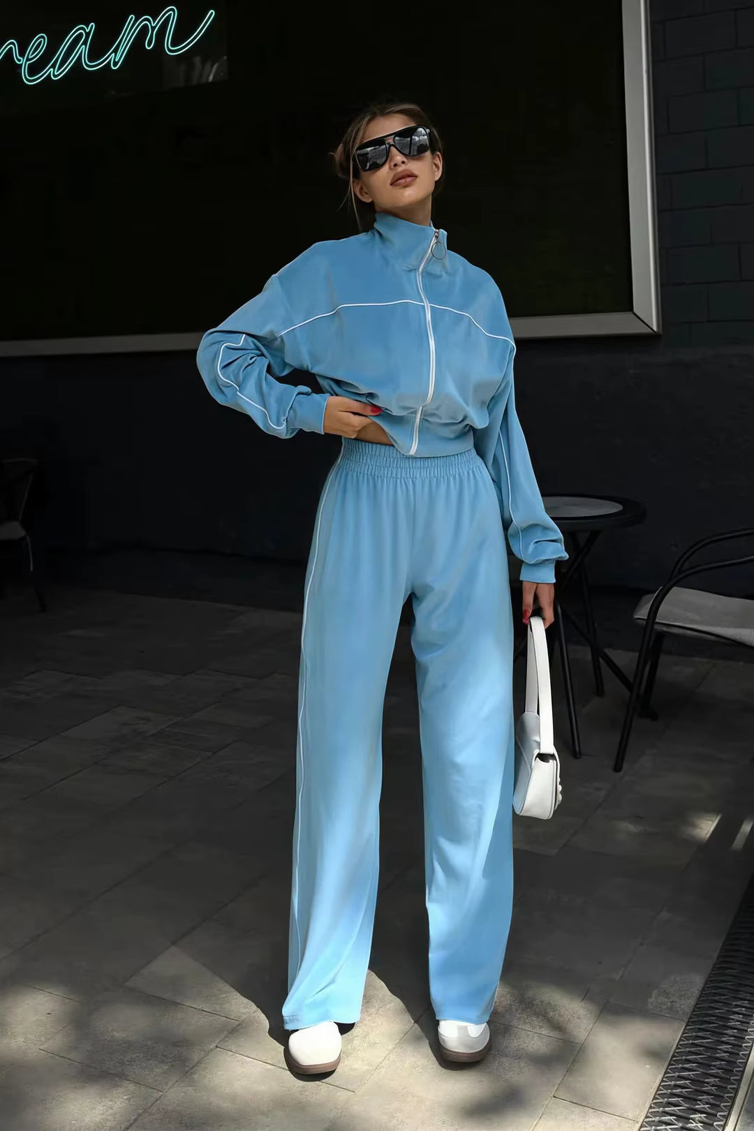 Light blue contrast-piping tracksuit with cropped zip track jacket, high collar and relaxed wide-leg pants