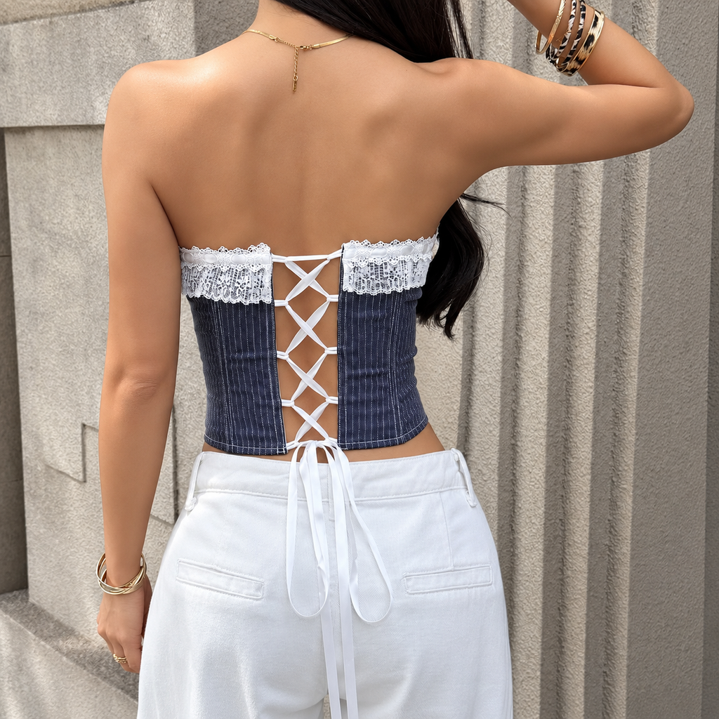 Back view of pinstripe corset top showing adjustable crisscross ribbon lacing and strapless fit