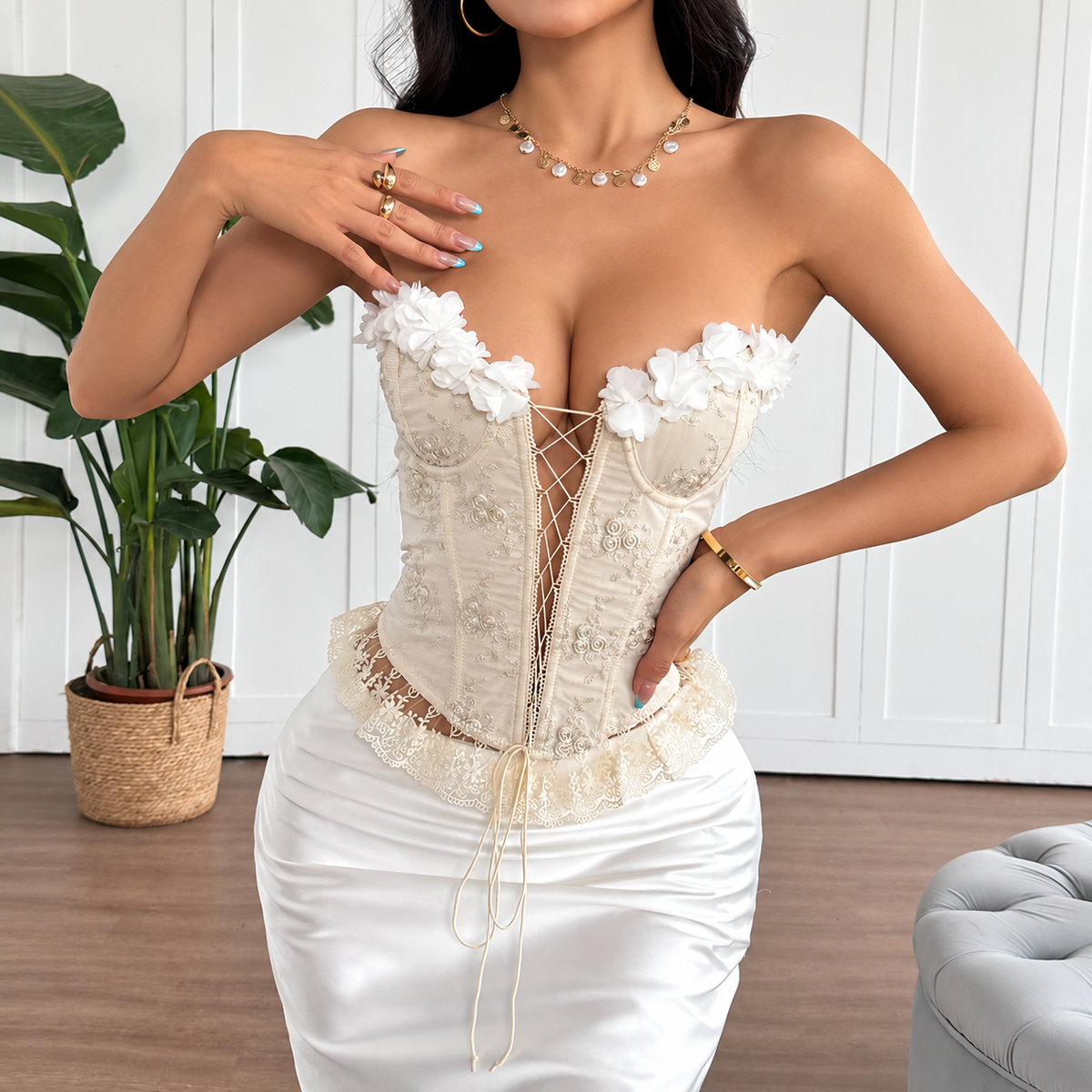 Ivory 3D flower corset top with tonal floral embroidery, sculpted cups and lace-up front, full front view