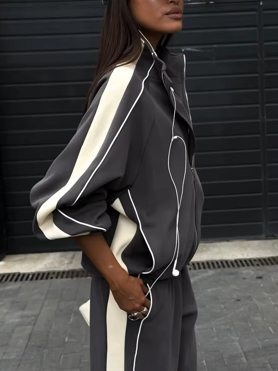 Charcoal gray contrast stripe tracksuit with cream side panels, zip jacket and wide-leg pants