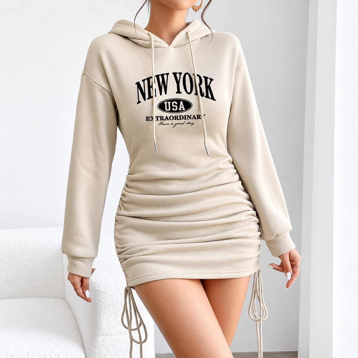 Women's ruched hoodie mini dress with New York graphic and adjustable side ties