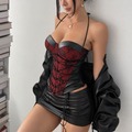 Red floral lace corset bustier with black side panels, halter neckline and pointed front hem