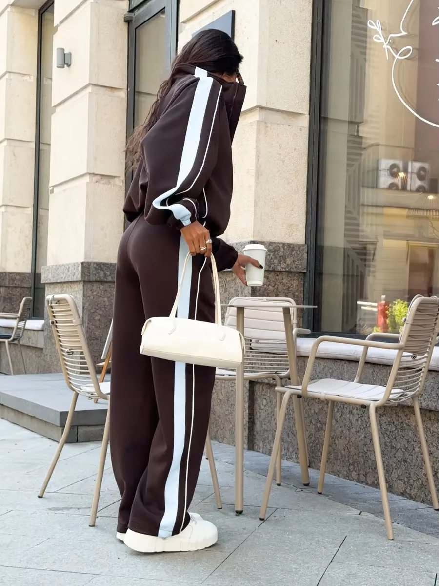 Back View Chocolate brown contrast stripe tracksuit side view with relaxed zip jacket and wide-leg pants