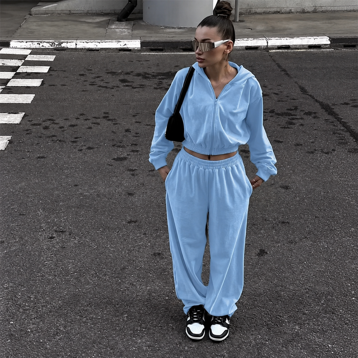 Light blue cropped hoodie tracksuit set with elasticated waist, side pockets and loose pants