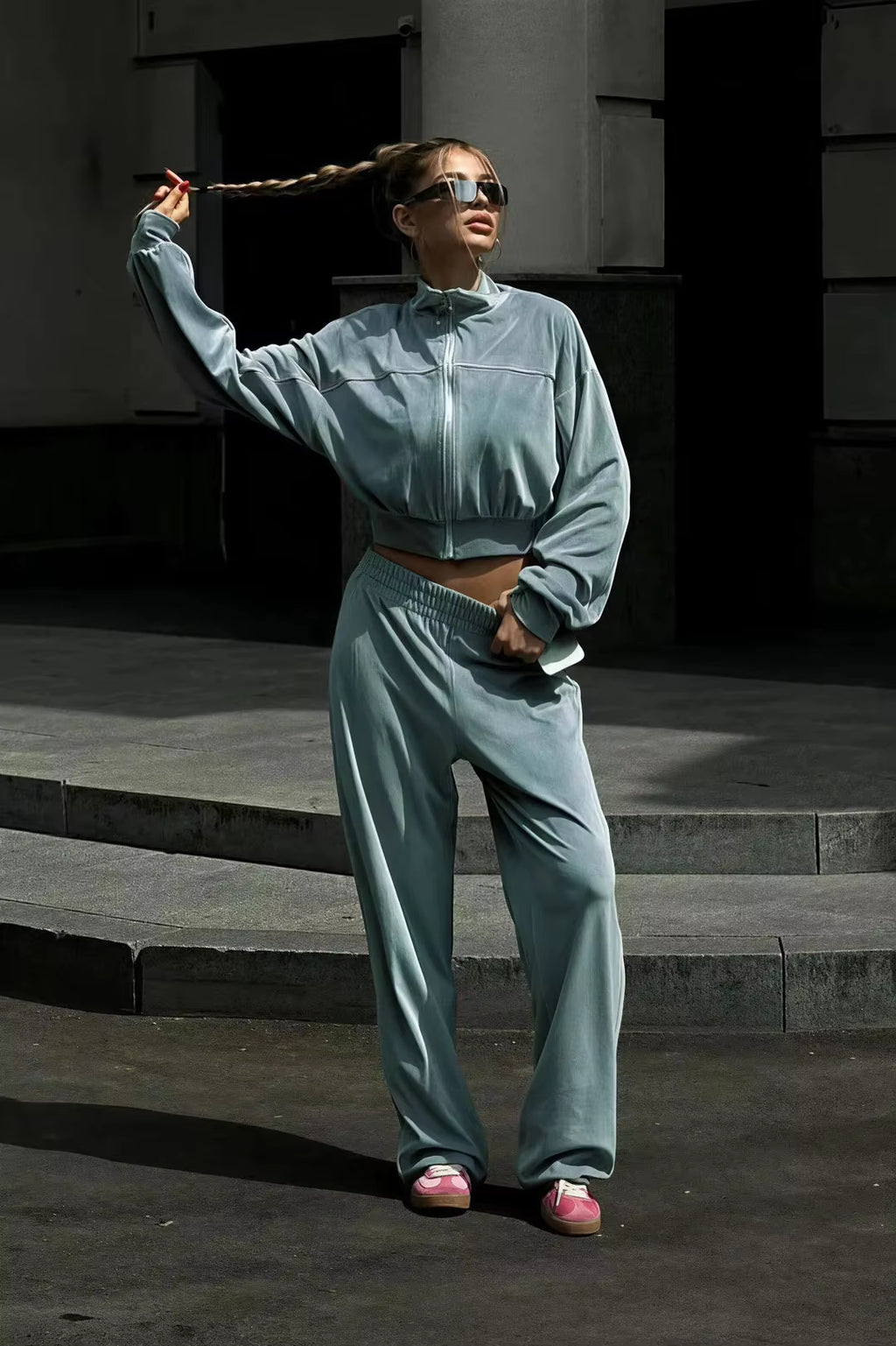 Sky blue contrast-piping track jacket and wide-leg pants matching set styled outdoors