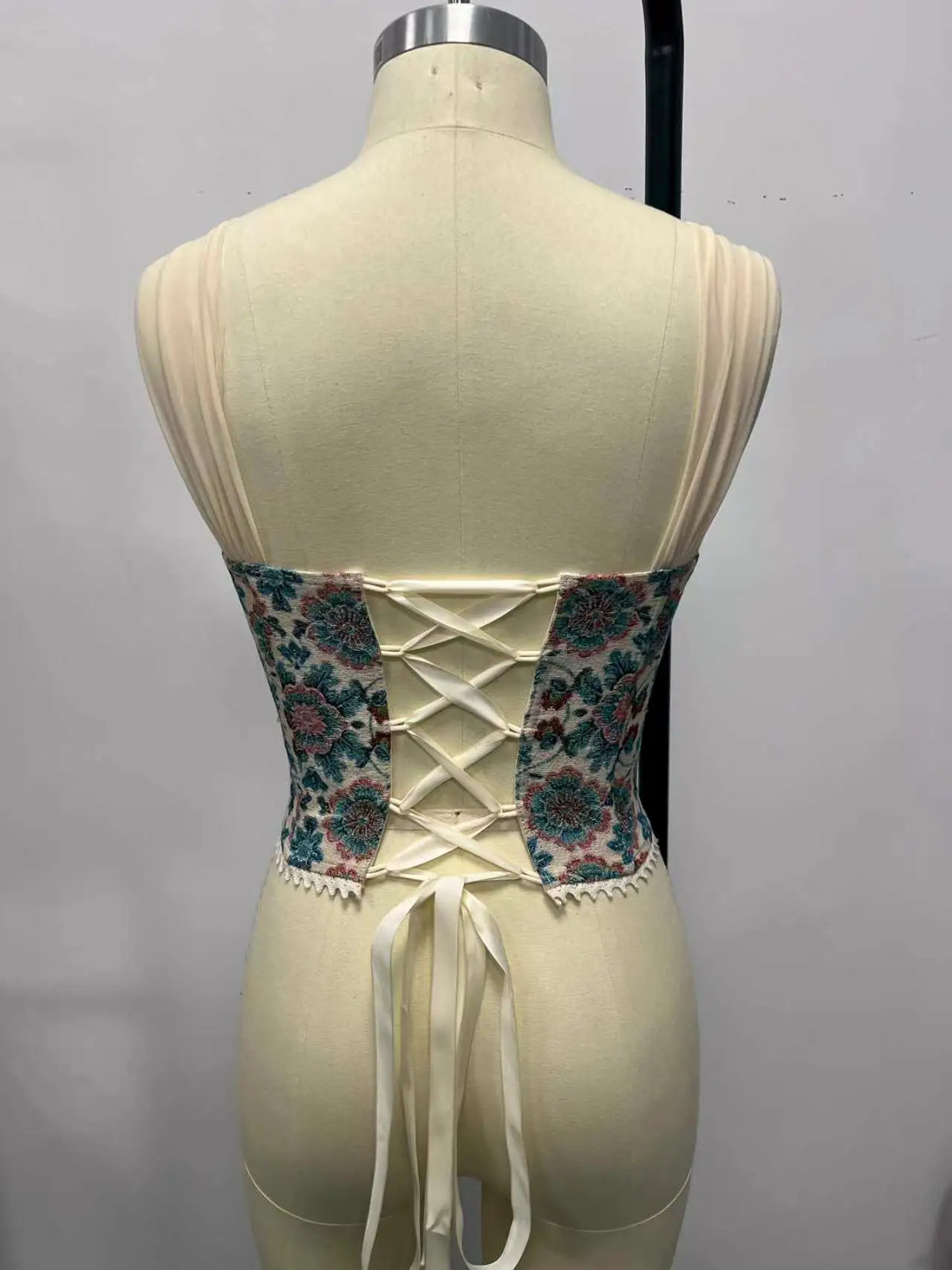 Floral tapestry corset top with sculpted cups and vintage-inspired floral pattern